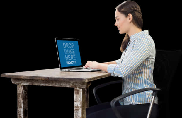 Woman Workingon Laptopat Desk PNG Image