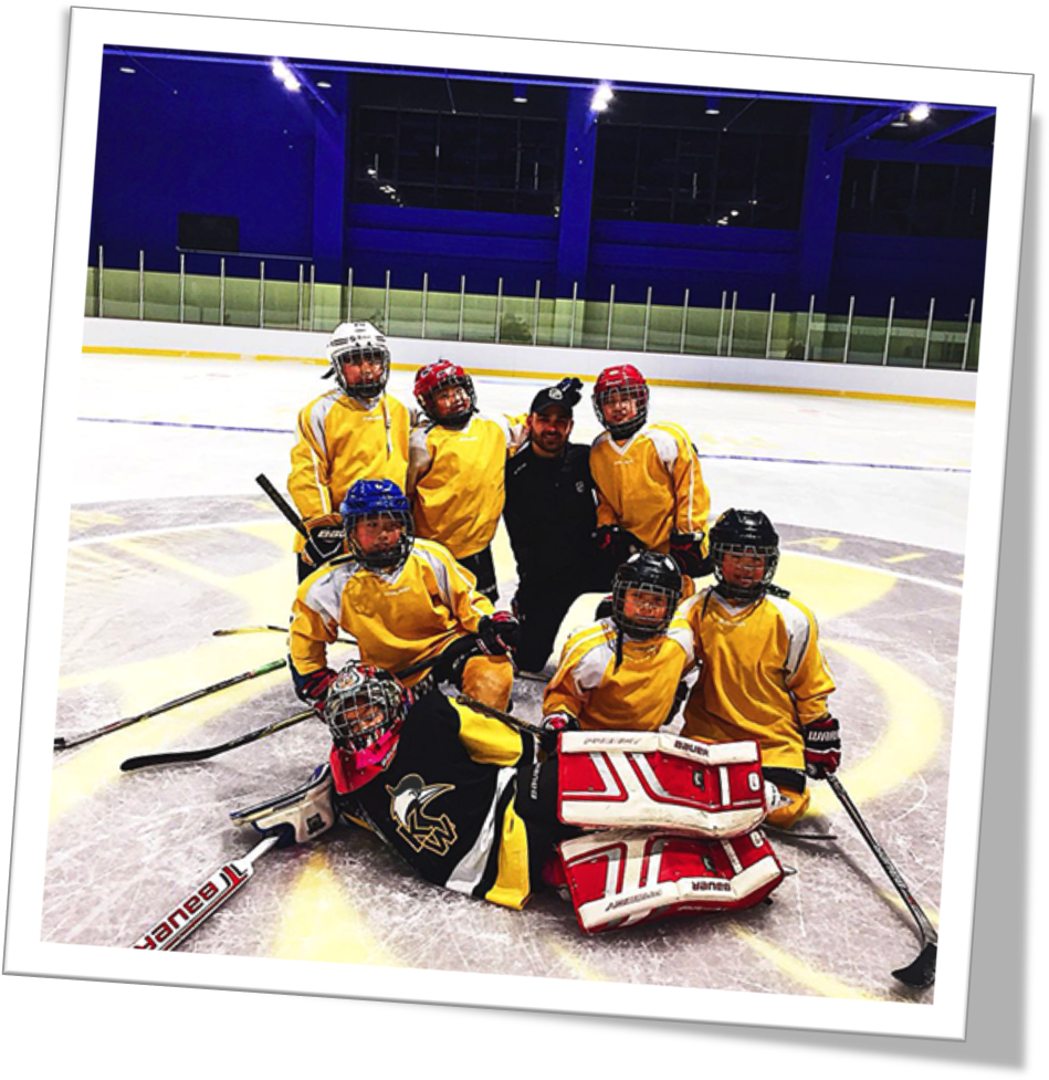 Youth Hockey Teamand Coachon Ice PNG Image