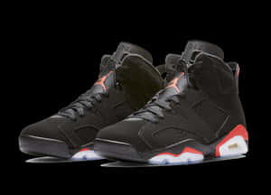 Air Jordan Sneakers Black Background PNG image with transparent background