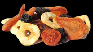 Assorted Dried Fruits Black Background PNG with transparent background