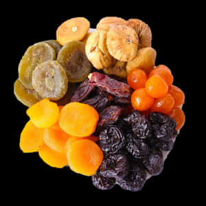 Assorted Dried Fruits Black Background PNG image with transparent background