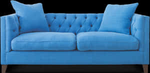 Blue Tufted Upholstered Couch PNG image with transparent background