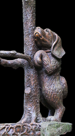 Bronze Dog Sculpture Looking Upward PNG image with transparent background