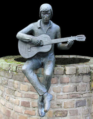 Bronze Guitarist Statue PNG image with transparent background