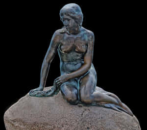 Bronze Mermaid Sculpture PNG image with transparent background