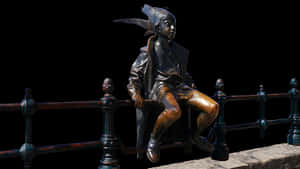 Bronze Statue Boy Sitting Fence PNG image with transparent background