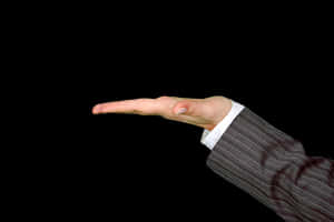 Business Hand Gesture Against Black Background PNG image with transparent background