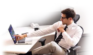 Businessman Using Laptop Office Setting PNG Image