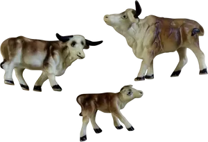 Ceramic Cowand Calf Figurines PNG Image