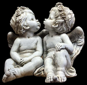 Cherub Figurines Gazingat Each Other PNG image with transparent background