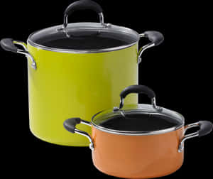 Colorful Kitchen Pots Black Background PNG image with transparent background