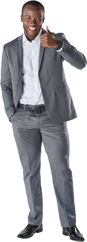 Confident Businessman Giving Thumbs Up PNG Image