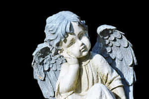Contemplative Angel Statue PNG image with transparent background