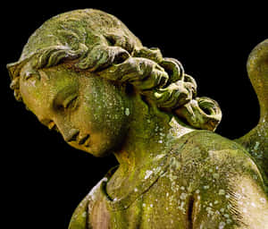 Contemplative Angel Statue PNG image with transparent background