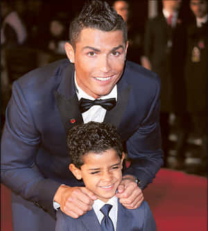 Cristiano Ronaldo Smiling With Child At Event PNG image with transparent background
