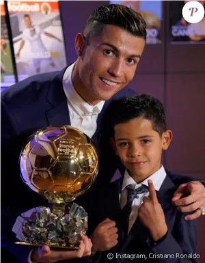 Cristiano Ronaldowith Golden Balland Child PNG Image