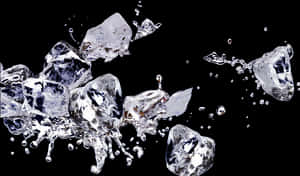 Dynamic Ice Cubes Splash Black Background PNG image with transparent background