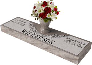 Elegant Grave Markerwith Floral Arrangement PNG image with transparent background