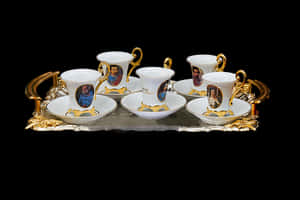 Elegant Tea Setwith Portraits PNG image with transparent background