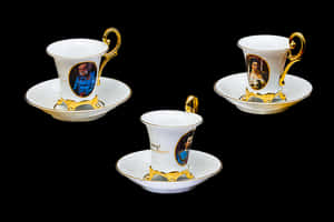 Elegant Teacupswith Portraits Gold Trim PNG image with transparent background