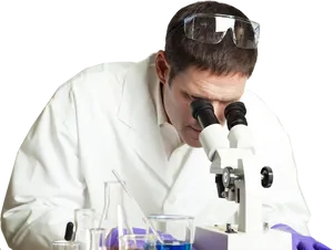 Focused Scientist Using Microscope PNG Image