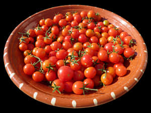 Fresh Cherry Tomatoesin Clay Bowl PNG image with transparent background