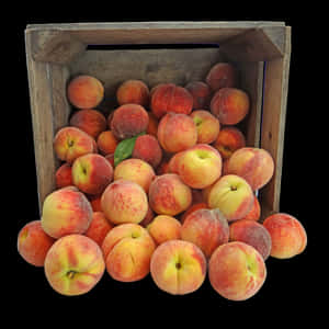Fresh Peachesin Wooden Crate PNG