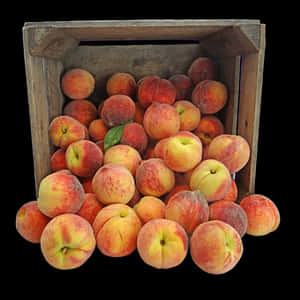 Fresh Peachesin Wooden Crate PNG with transparent background