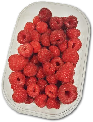 Fresh Raspberriesin Plastic Container PNG Image