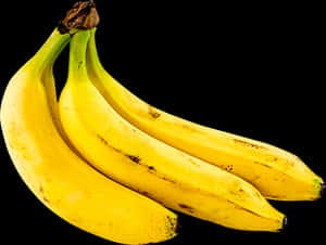 Fresh Yellow Bananas Black Background PNG image with transparent background