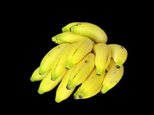 Fresh Yellow Bananas Black Background PNG image with transparent background