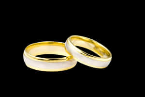 Goldand Silver Wedding Bandson Black PNG image with transparent background