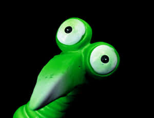 Green Slime Creature Toy PNG image with transparent background