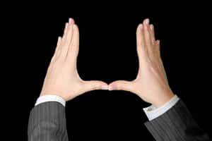 Hands Forming Frame Against Black Background PNG image with transparent background