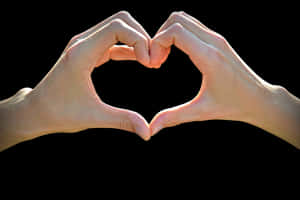 Heart Shape Hand Gesture Love Symbol PNG image with transparent background