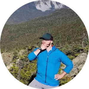 Hiker_ Contemplating_ Mountain_ View.jpg PNG Image