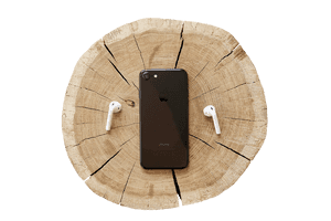 i Phoneand Air Podson Wooden Stump PNG image with transparent background