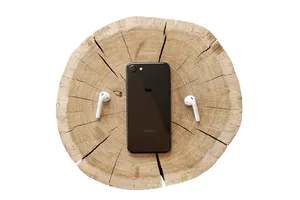 I Phoneand Air Podson Wooden Stump PNG Image