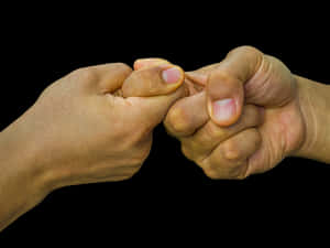 Interlocked Fingers Black Background PNG image with transparent background