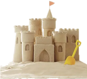 Intricate Sand Castlewith Shovel PNG Image