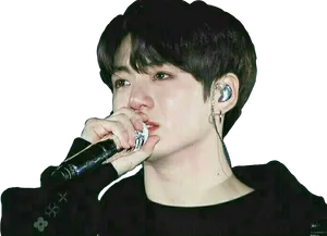 Jungkook Performingon Stage PNG Image