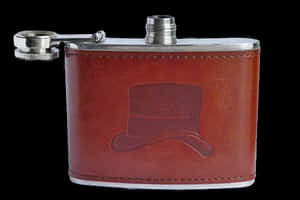 Leather Hip Flaskwith Top Hat Embossing PNG image with transparent background
