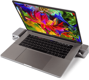 Mac Book Prowith Colorful Screenand Accessories PNG image with transparent background
