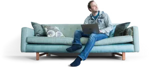 Man Relaxingon Sofawith Laptop PNG Image