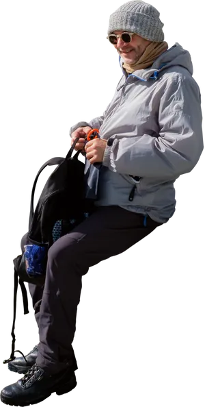 Man Sitting Outdoors Winter Gear PNG Image