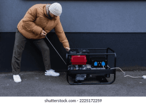 Man Starting Portable Generator Outdoors PNG image with transparent background