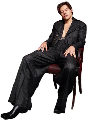 Manin Pinstripe Suit Seated PNG Image