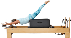 Pilates Reformer Swan Dive Exercise PNG image with transparent background