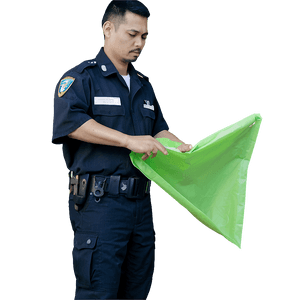 Police Officer Examining Green Bag PNG
