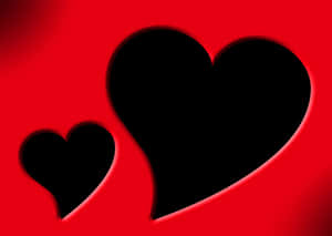 Red Heart Shapeson Black Background PNG image with transparent background